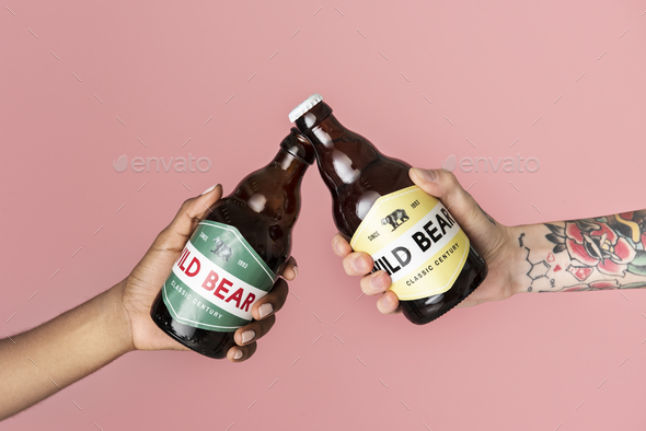 Tattooed Male With Stylish Beard And Hair Holds Pint Of Craft Beer Sitting  At The Bar Counter In The Indie Brewery Stock Photo - Download Image Now -  iStock