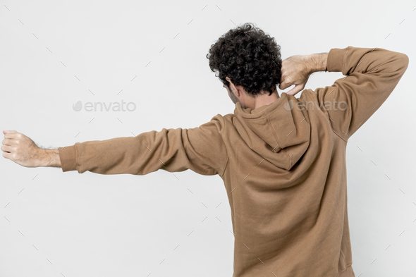 Man in a brown hoodie isolated on white background