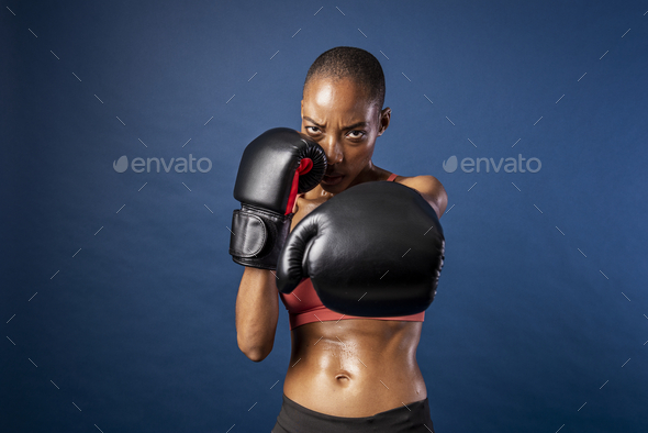 Fit black woman ready for a boxing match