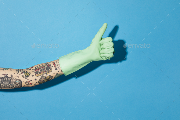 Tattooed hand thumbs up in a rubber glove Stock Photo by Rawpixel
