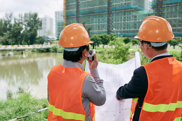 Managing work Stock Photo by DragonImages | PhotoDune