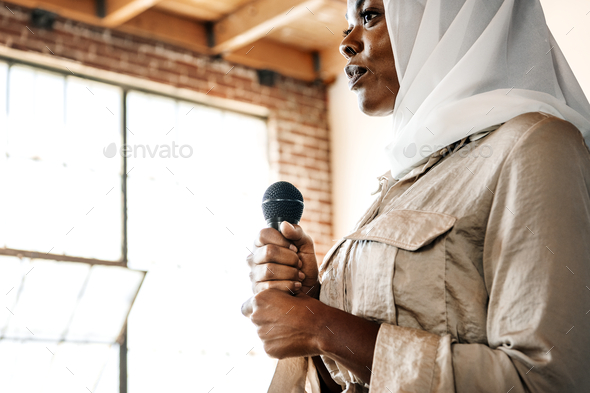 Muslim speaker - Stock Photo - Images