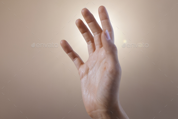 Hand pressing an invisible screen gesture - Stock Photo - Images