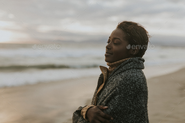 Woman enjoying the breeze - Stock Photo - Images