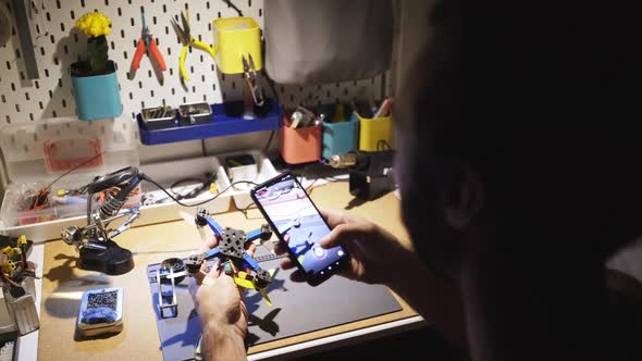Man Take Video of Repair DIY Electronic