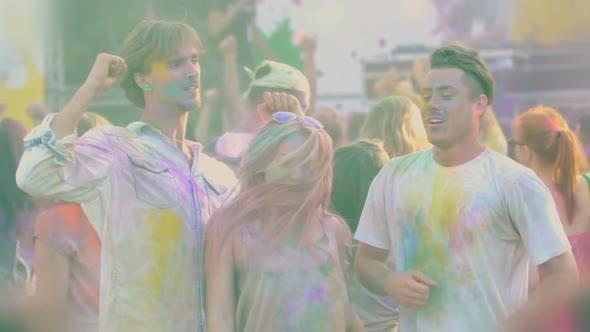 Amazing Holi Festival, Young Happy Friends Dancing and Hanging Out at Concert alt