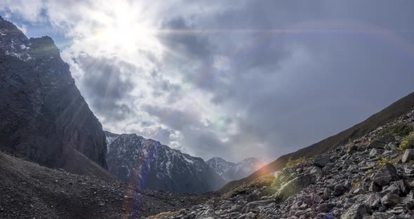 Timelapse of Epic Clouds in Mountain Valley at Summer or Autumn Time. Wild Endless Nature and Snow alt