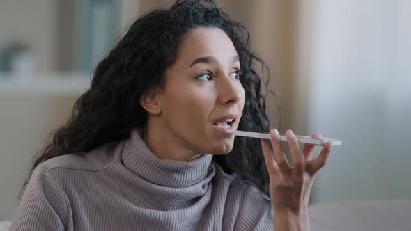 Closeup Smiling Happy Young Woman Talk on Speakerphone Record Audio Message Using Telephone Hispanic alt
