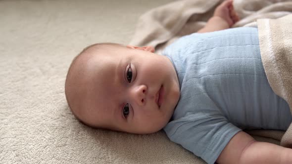Closeup Side View Funny Cute Kid 2 Month Newborn Boy Falling Asleep After Bath Shower On White Soft alt