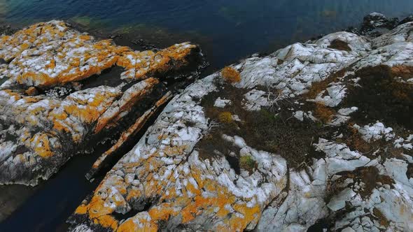 Aerial shot of a small island in Alona Bay, Lake Superior, Ontario, Canada alt