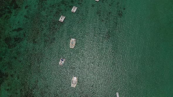 Top View of Snow-white Catamarans Floating on the Indian Ocean, Coral Reef of the Indian Ocean alt