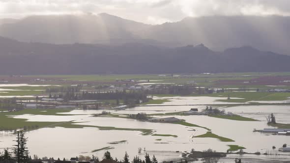 Devastating Flood Natural Disaster in the City and Farmland After Storm alt