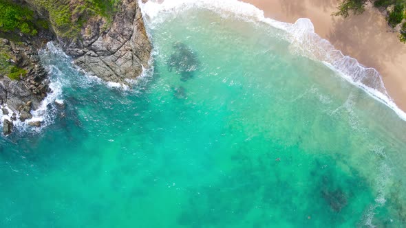 Aerial view over white beach sand and sew water clear. Nature view tropical beach Phuket, Thailand. alt