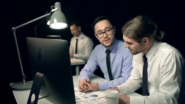 Business people discussing data alt