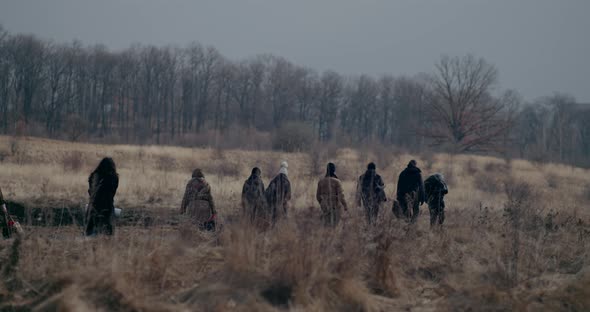 Ukrainian Refugees Walking On Road During War Crisis alt