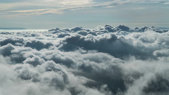 timelapse foggy or over the clouds while sunrise sky.