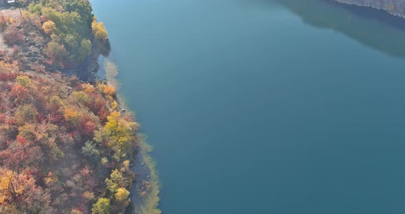 Artificial Pond with Azure Water and Picturesque Flooded Quarries alt