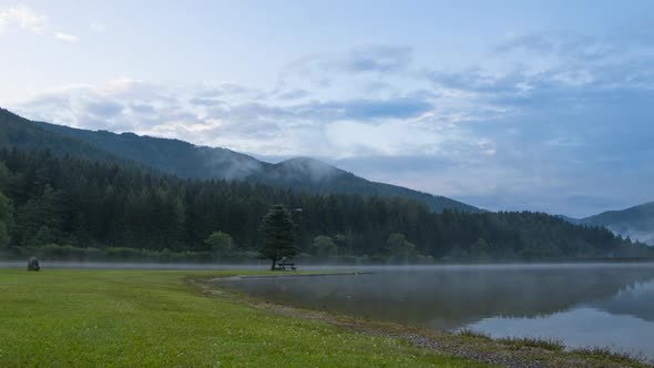 Morning Mist over the Forest Lake
