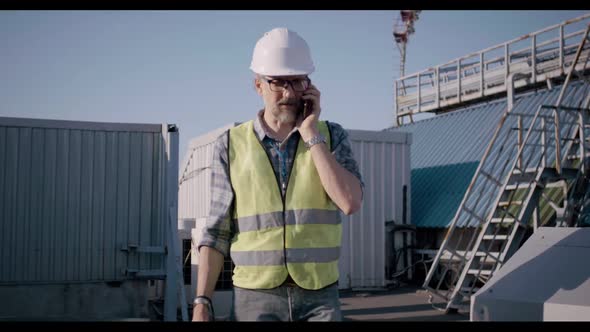 Engineer Having a Phone Call alt