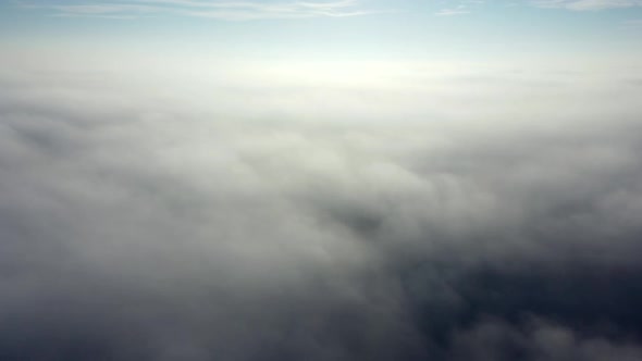 Aerial Drone View Flight Over Fog alt