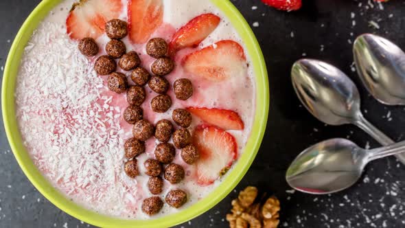 Yummy Strawberries, Flakes, Coconuts Are Sinking in the Foamy Bl alt