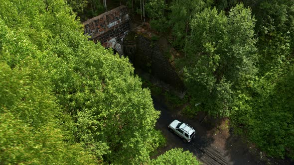 Aerial View of the Car Entering the Tunnel alt