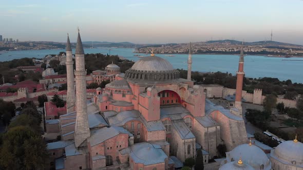 Hagia Sophia Holy Grand Mosque (Ayasofya Camii) with Bosphorus and city skyline on the background alt