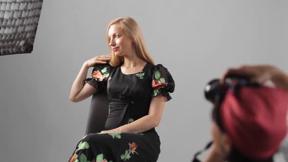 Woman Posing at Photo Studio alt