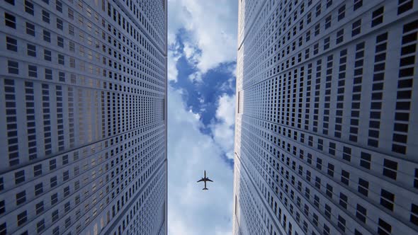 Airplane Flies Over Business Skyscrapers