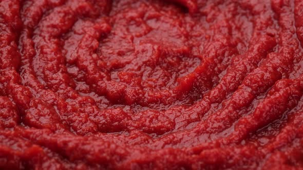 Tomato sauce or ketchup. Fresh tomato pasta sauce top view rotation alt