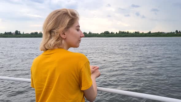 Beautiful Female Tourist on a Boat Tour in Beautiful City Canal River