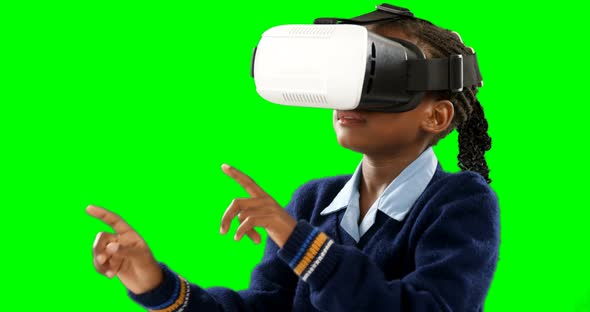 Schoolgirl using virtual reality headset 4k alt