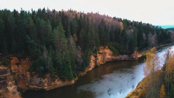 Erglu Cliffs and Great View on the Gauja River Cesis, Latvia. Autumn Landscape Red Rocks Stone Cliff alt