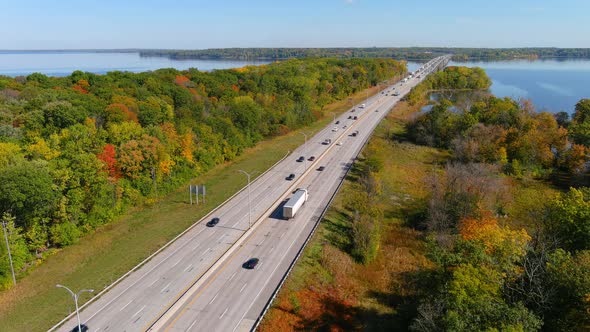 Trans-Canada highway, Lake of Two Mountains Bridge and fall season colors in Montreal.