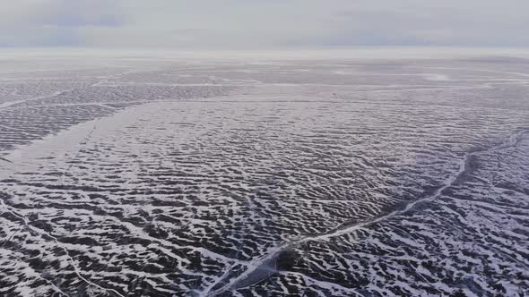 Aerial View of Winter Ice Landscape on Lake Baikal.