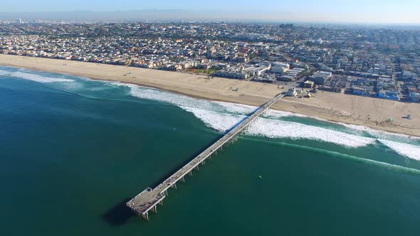 Aerial shot of of the beach and ocean. alt