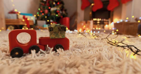 Toy car carrying gift box alt