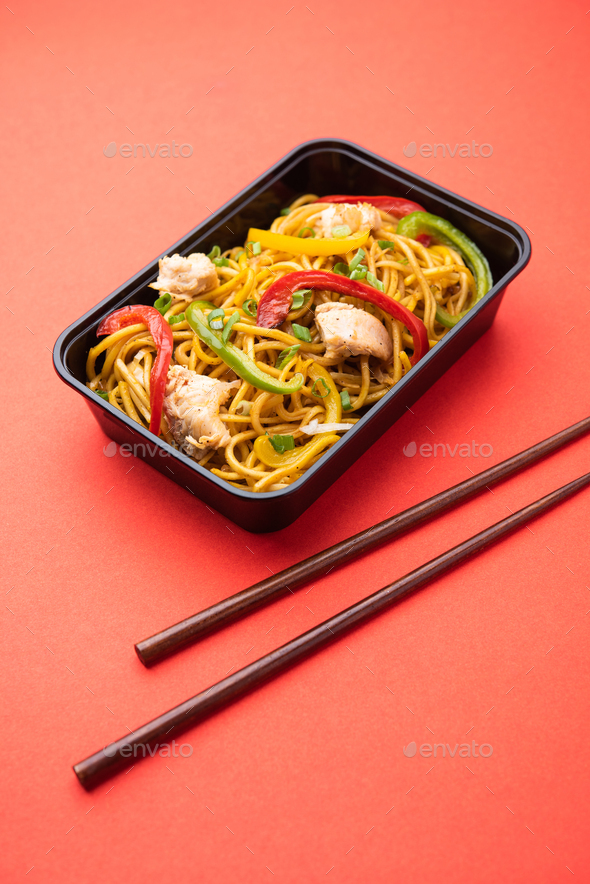Indo chinese Schezwan Noodles, chicken Hakka Noodles packed in plastic box for online food delivery