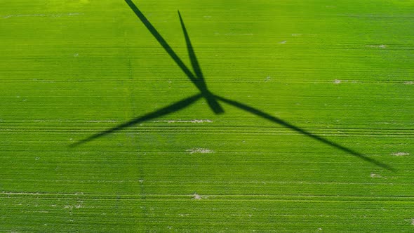 Wind Turbine Shadow On The Field 02