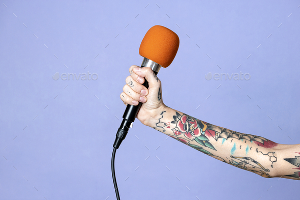 Download Hand With Tattooed Holding A Microphone Mockup Stock Photo By Rawpixel