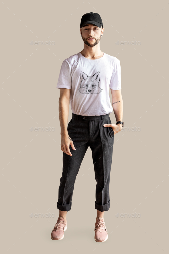 Joyful male model posing standing on one foot Royalty-Free Stock Image -  Storyblocks