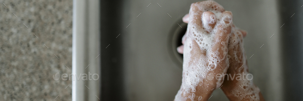 Wash your hands with soap and water to protect yourself from cor - Stock Photo - Images