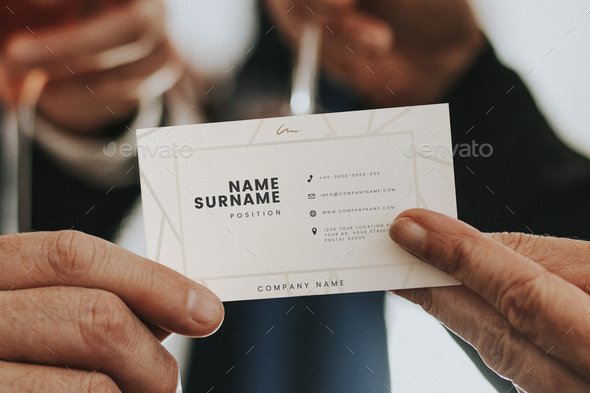Presenting a name card - Stock Photo - Images