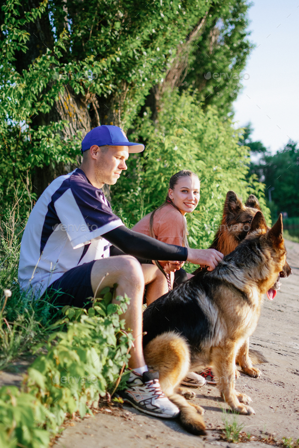 Active Family, fitness couple, Pet Love, Dog Training, best dog breeds for family. Young sports