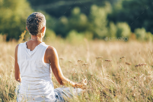 Positive Energy Meditation – Mindful Woman Meditating Outdoors, Absorbing the Positive Energy