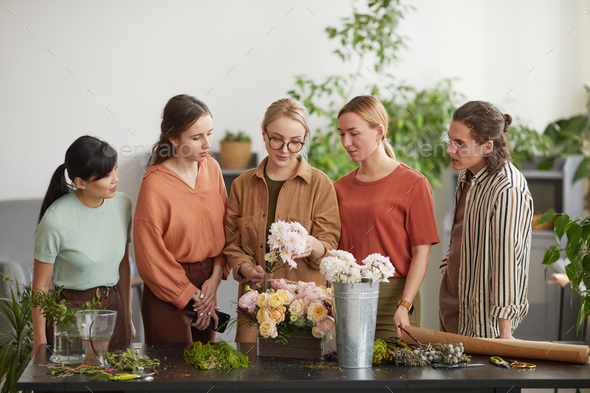 Diverse Group of People in Florists Workshop