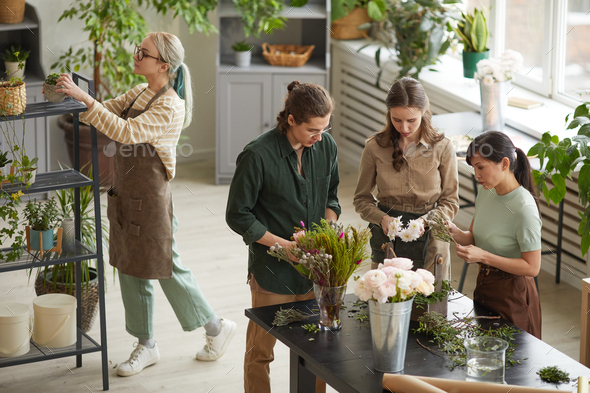 Diverse Group of People in Florists Workshop