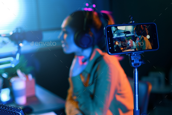 Young vlogger streaming a live video - Stock Photo - Images