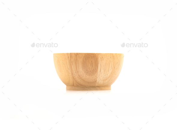 Bowls and utensils made of wood, isolated on white background