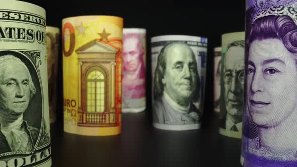 Foreign currency money exchange concept. Many banknotes of different nations. alt